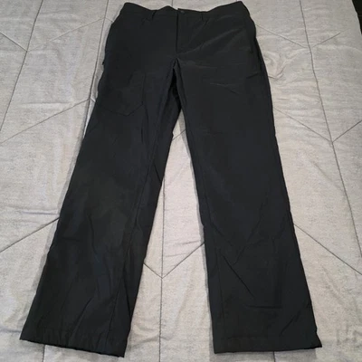 Pantalones técnicos Eddie Bauer negros forrados de lana para hombre 34x32 elásticos rendimiento cargo Foto 1 de 4