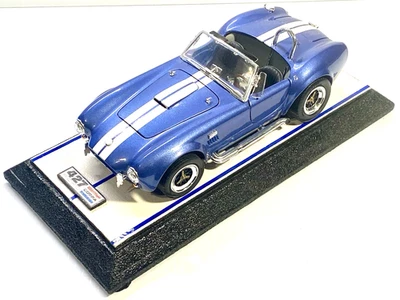 Yat Ming Custom 1965 Shelby Cobra 427/SC  1:18 Wall Art with a custom Exoto Base - Image 1 of 4