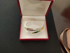Bracciale semirigido in oro e smalti - Foto 1 di 3