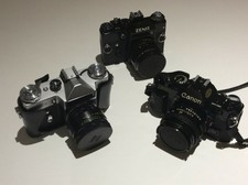 Job lot: Canon AE-1, Zenit E, Zenit 11, Lowepro, bags and accessories