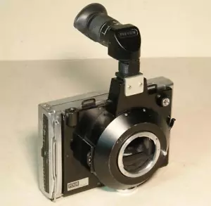 Fotocamera posteriore pellicola vintage Four Designs azienda polabody Nikon anteprima reflex Polaroid - Foto 1 di 5