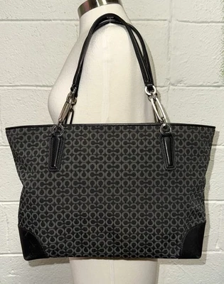 Cartera de hombro Coach Madison Op Art Tote 2013 de lona negra con cadena de cuero 26767 Foto 1 de 4