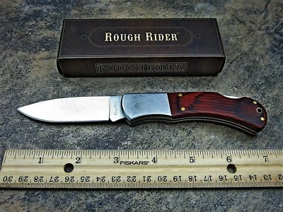 ⚡Cuchillo de hoja plegable de acero inoxidable con mango de madera de grano rico con bloqueo Rough Rider ⚡182⚡ Foto 1 de 4