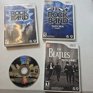 Lot of 4 Guitar Hero & Rockband Wii games: Beatles,Track Pack, World Tour  - Picture 1 of 9