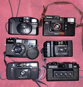 Lot (6) appareils photo 35 mm Point & Shoot Nimslo 3D Minolta Hi-Matic S Pentax Canon - Photo 1/2