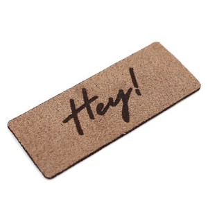 10er Set Label Nähetiketten zum Aufnähen 6x2,5cm in Leder Optik 01 Hey! - Bild 1 von 6