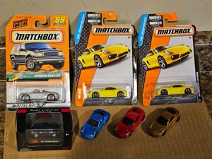 Hot Wheels Matchbox Malibu Lot of 7 Porsche Cayman S Blue Silver Red Yellow 1:87 - Picture 1 of 3