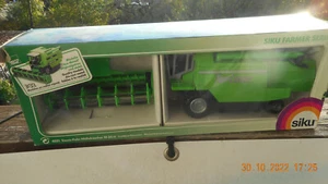 Siku Mähdrescher Deutz Topliner 4051 alt M 1 32 m Mähwerk u OVP wenig bespielt - Bild 1 von 12