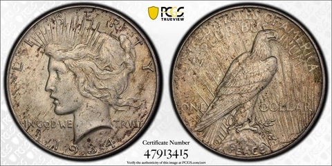 1934 Peace Silver Dollar PCGS AU58 Gold Shield Cover