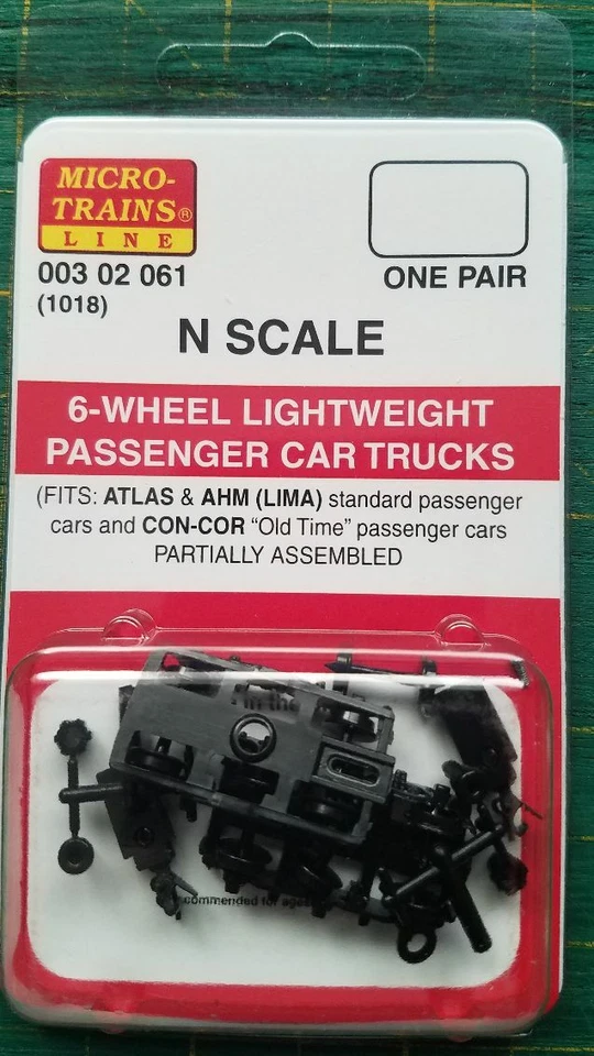 N MICRO TRAINS  003 02 061 Black 6 Wheel Lightweight Passenger Car Trucks  1018 - Image 1 of 1