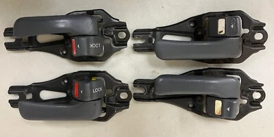 JUEGO COMPLETO palanca de manija interior puerta interior Toyota Land Cruiser FJ80 GRIS OEM 4 piezas Foto 1 de 2