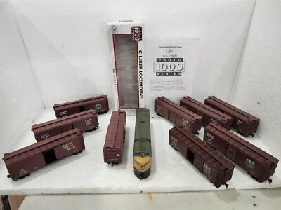 CANADIAN NATIONAL HO C-LINER ALL WHEEL DRIVE MAGNETIC COUPLERS & 9 CNR BOXCARS - Image 1 of 4