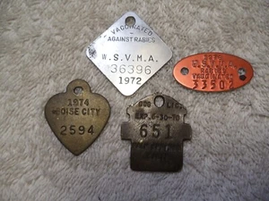 VINTAGE DOG TAGS 1970'S LOT OF 4 - Picture 1 of 2