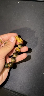 Pulsera pixiu oro puro 24k con cuentas ojo de tigre Foto 1 de 4