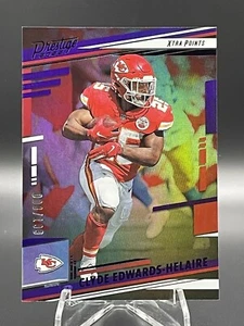2022 Panini Prestige Clyde Edwards-Helaire Xtra Punkte lila/199 #142 Häuptlinge - Bild 1 von 3