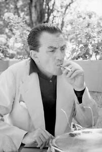 Italian director Luchino Visconti smoking during XVIII Venice Inte- Old Photo 1
