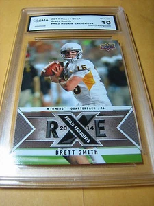 BRETT SMITH WYOMING SABERCATS 2014 CUBIERTA SUPERIOR NOVATO EXCLUSIVOS RC RE2 GRADO 10 - Imagen 1 de 1