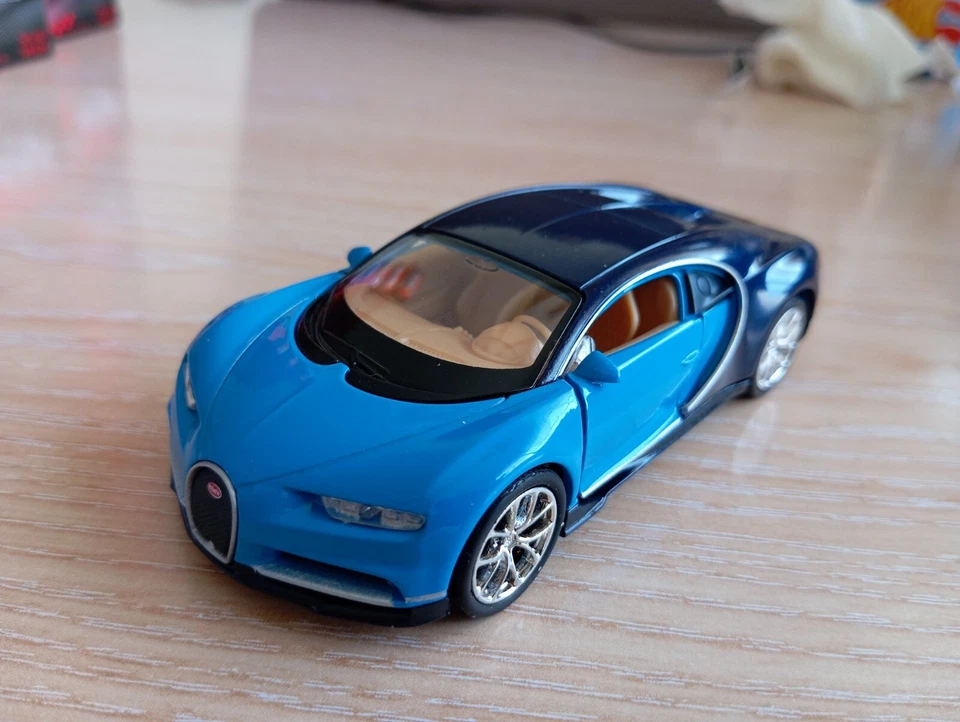 WELLY -  BUGATTI CHIRON     BLUE      1:34-1:38 *NEW* - Image 1 of 4