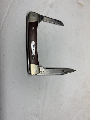 Navaja de bolsillo plegable vintage Buck 705 EE. UU. mango de madera 2 hojas acero inoxidable Foto 1 de 4