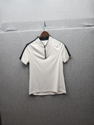 Camisa polo Greg Norman blanca y negra de manga corta con detalles de cremallera dorada para mujer M Foto 1 de 4