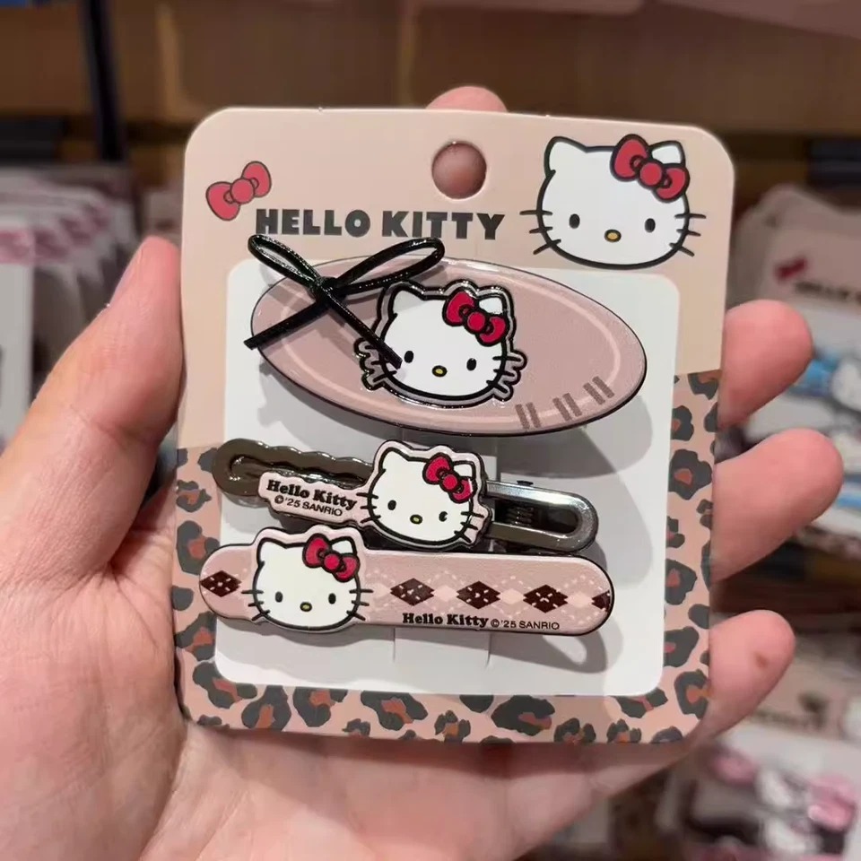 [AUTHENTIC] MINISO HELLO KITTY MILK COFFEE LEOPARD PRINT SERIES HAIR CLIPS K24 - Image 1 of 1