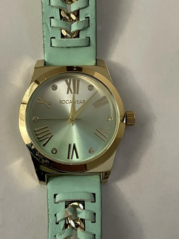 Relógio analógico feminino Rocawear elegante redondo tom dourado pulseira azul-petróleo em PERFEITO ESTADO!! - Imagem 1 de 4