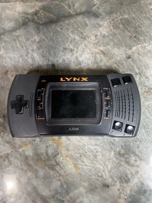 Sistema de consola Atari Lynx II 2 para piezas o reparación no lee juegos Foto 1 de 4