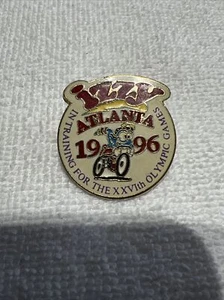 1996 OLYMPIC PIN IZZY ROAD CYCLING PIN IN TRAINING PIN. Lot L5 - Picture 1 of 4