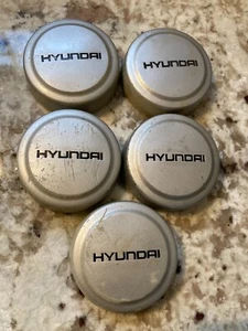 (5) older Hyundai 3 1/4" silver wheel center caps - Picture 1 of 4