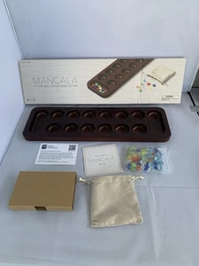 Mancala - A Count-and-Capture Game for Two - Picture 1 of 6