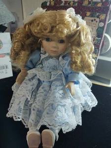 Collector's Choice Genuine Fine Porcelain Doll Sitting Doll 9" - Picture 1 of 7