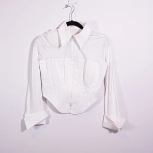 Camisa Anne Fontaine Eddie Blanca Manga Larga Cremallera Jersey Tejido Con Corsé de Piqué - Imagen 1 de 5
