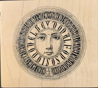 Un sello en la mano estampado celestial círculo cara sol y luna sello de goma Foto 1 de 3