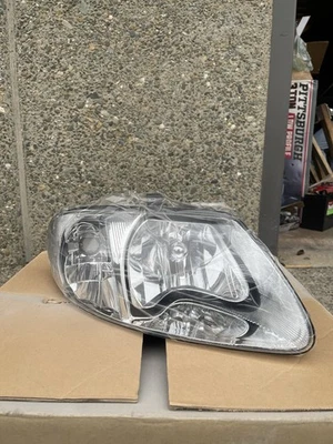 Par de faros de repuesto estilo fábrica Dodge Grand Caravan 2001-2007 Foto 1 de 4