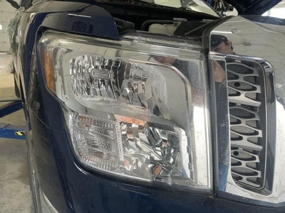 Passenger Headlight Halogen Chrome Interior Bezel Fits 16-19 TITAN XD 913971 - Image 1 of 4