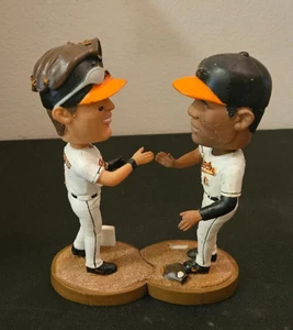 BALTIMORE ORIOLES BRIAN ROBERTS & MELVIN MORA OLD BAY SGA BOBBLEHEAD SET - Picture 1 of 5