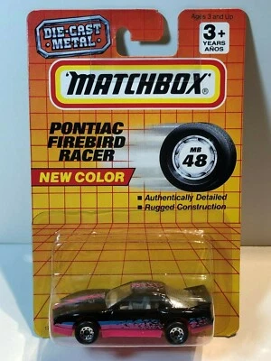 MATCHBOX MB48 / 60 PONTIAC FIREBIRD RACER BLACK WITH BLUE & PINK DECO - Image 1 of 2