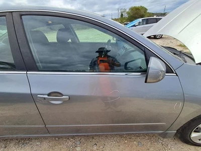 Nissan Altima 2007 pasajero puerta delantera carcasa usada OEM gris 112 k millas Foto 1 de 4