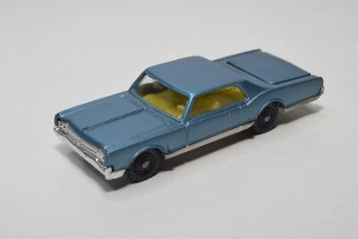 B32 1:60 3INCH HUSKY OLDSMOBILE STARFIRE COUPE MET. BLUE NMINT COND. - Изображение 1 из 4