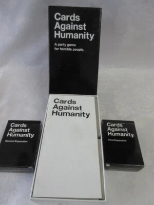 Juego de cartas Cards Against Humanity 2015 con expansiones #1 y #2, usado, ¡ex! Foto 1 de 4