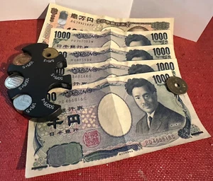 14,375 Japanese YEN current circulation Cash (with handy change holder!) - Picture 1 of 1