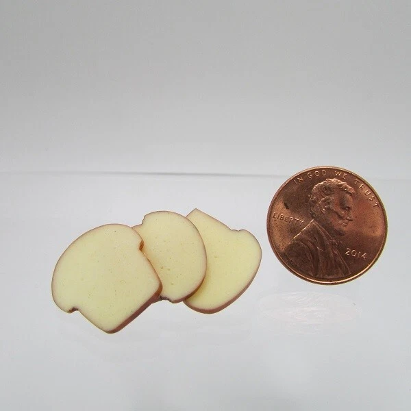 Rebanadas de pan en miniatura para casa de muñecas 3 piezas IM65509 Foto 1 de 1