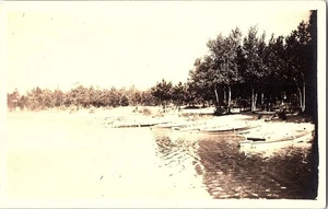 RPPC Postcard Riverside or Lake Scene with Boats on Shoreline c1930 - Picture 1 of 2