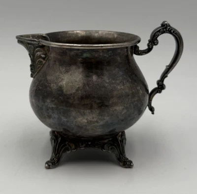 Jarra crema plateada Oneida Foto 1 de 4