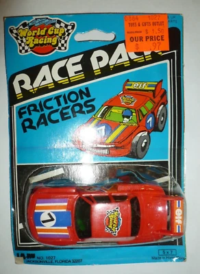 Raro Coche de Fricción de Carrera Ja-Ru 7 ELF Copa Mundial 1027 de Colección en Tarjeta Foto 1 de 3