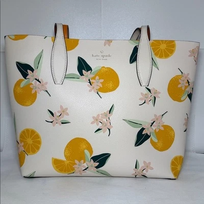 Bolso de Mano Kate Spade Estampado Cítrico Flor Naranja Reversible Interior Foto 1 de 4