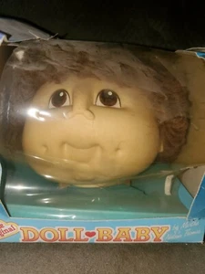 The Original Doll Baby Doll Head brunette loops hair NOS. - Picture 1 of 1