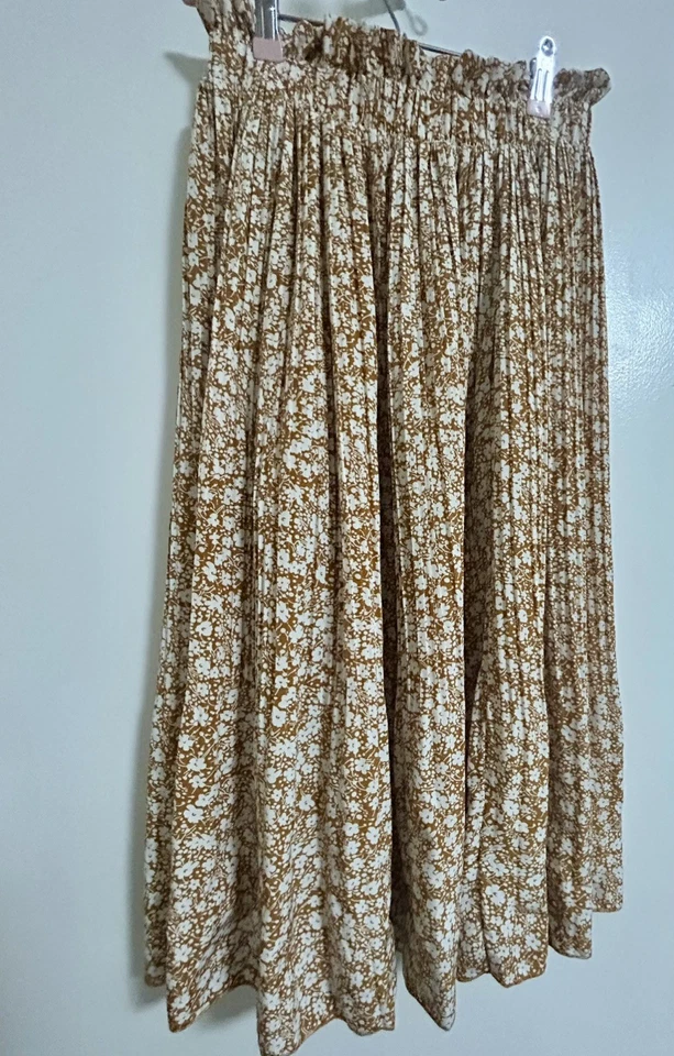 Falda plisada floral amarillo mostaza Foto 1 de 2