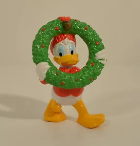 Figura de acción de plástico PVC de 2,5" del Pato Donald con corona navideña aplausos - Imagen 1 de 2
