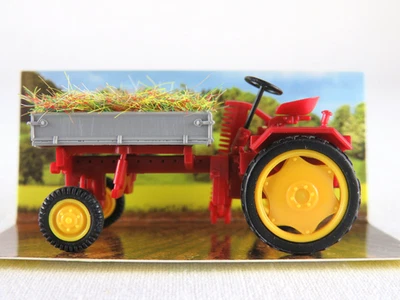 Mehlhose/Busch 210005002 Traktor RS09 Pritsche mit Heuladung 1:87/H0 NEU/OVP - Bild 1 von 4